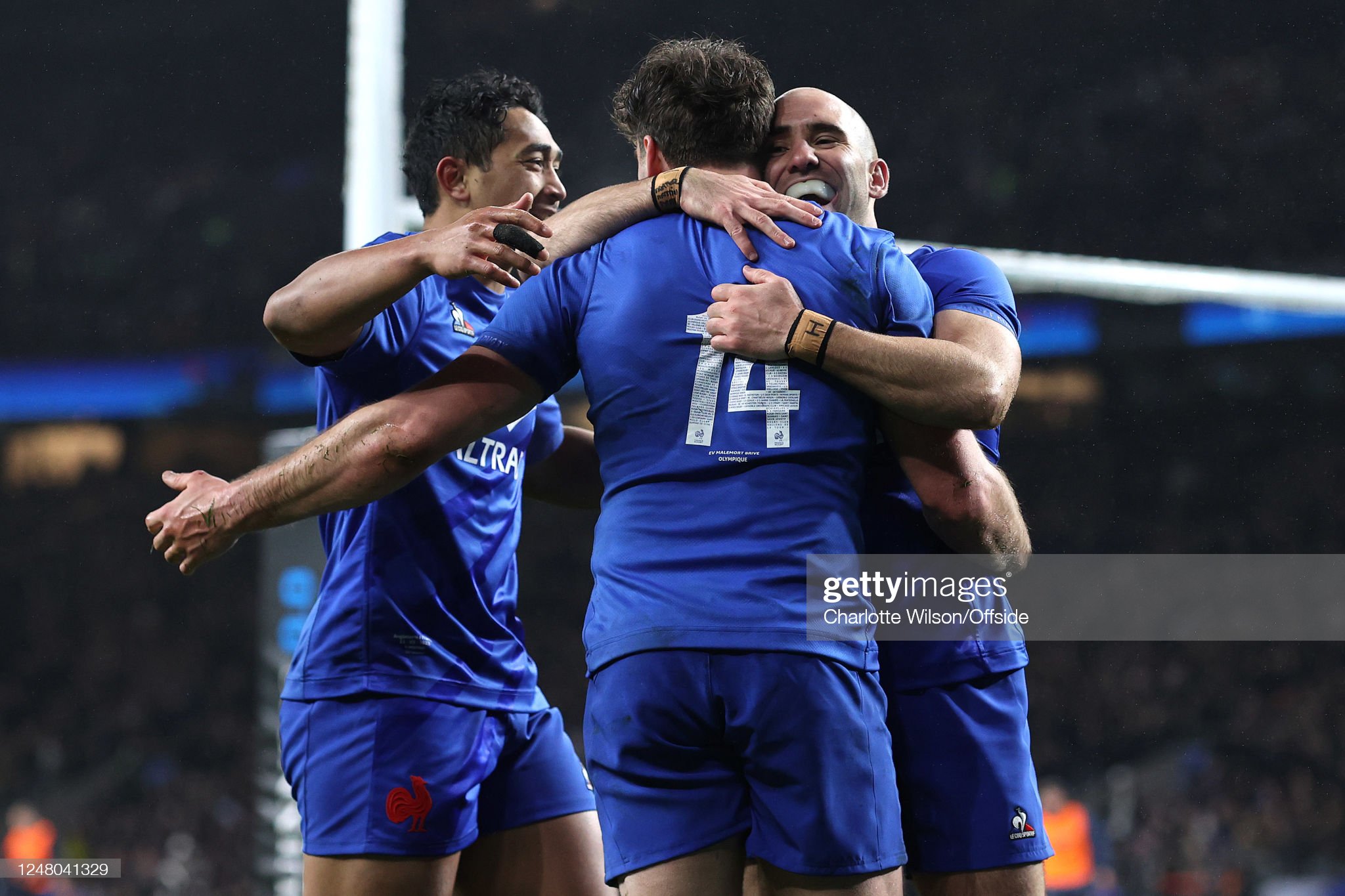 Maxime Lucu of France (right) celebrates their 4th try with scorer Damian Penaud during the Guinness Six Nations Rugby match between England and France at Twickenham Stadium